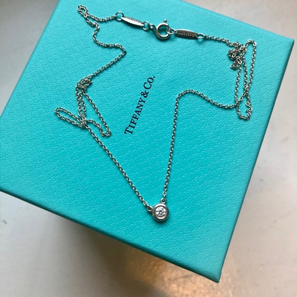 Tiffany & Co. Jewelry - Tiffany and co diamond by the yard pendant .10